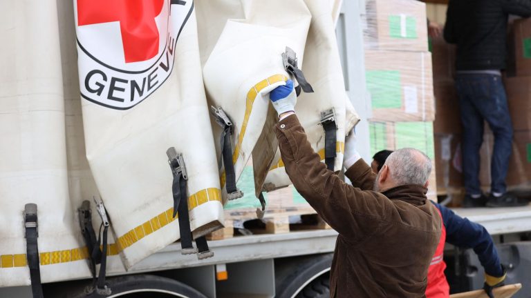 after three weeks of fighting, a first humanitarian aid plane has landed