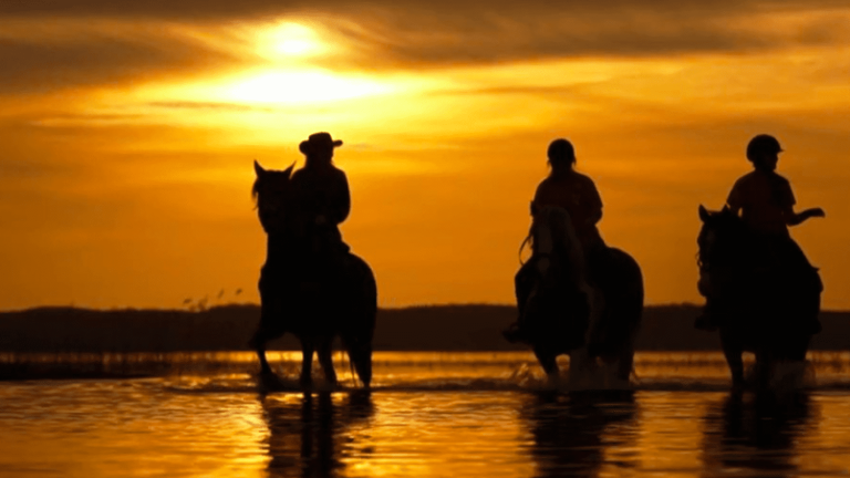 by the lakes, a heavenly sunset on horseback