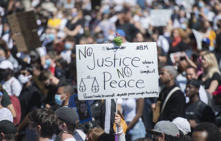 A demonstration against racial profiling and Bill 14 in Montreal