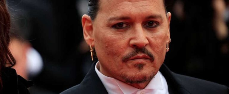 Accolades and autographs for Johnny Depp, back in Cannes