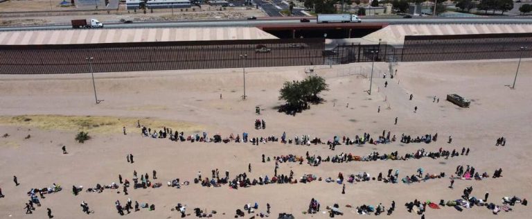 At 12, forced to wait between the wall and the barbed wire