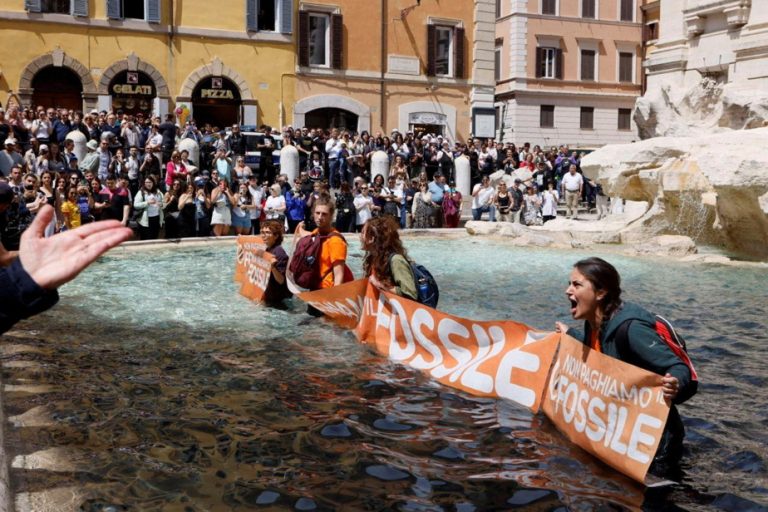 Italy |  Environmental activists color Trevi Fountain water black