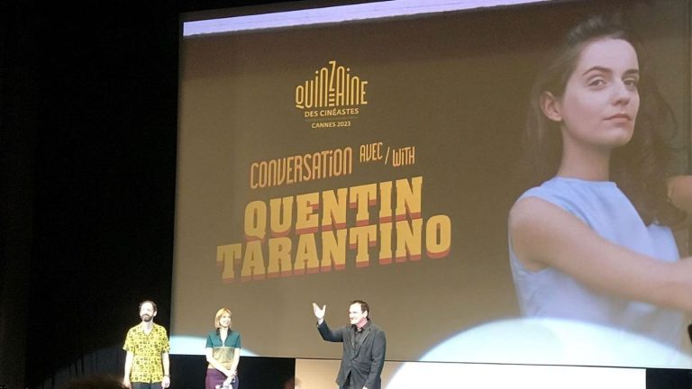 Quentin Tarantino sits down with the audience to watch his surprise session