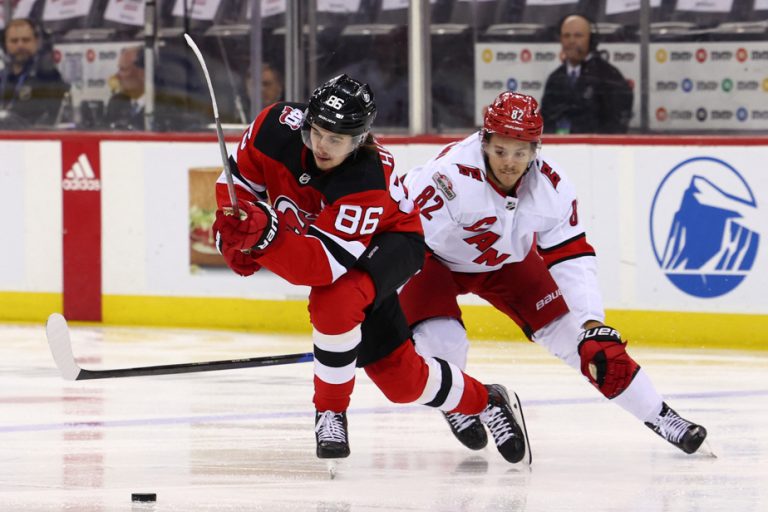 The Devils regroup and dominate the Hurricanes 8-4