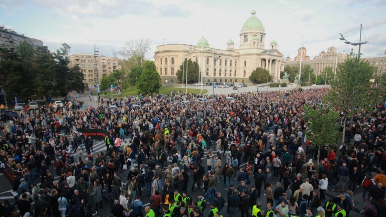 Thousands of Serbs protest violence, after two shootings that left 17 dead