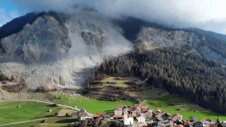 a mountain is in danger of collapsing on a village