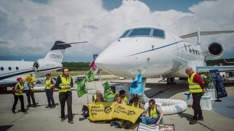 activists briefly interrupt air traffic at Geneva airport