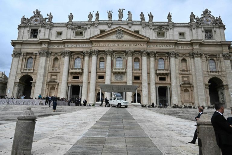 vatican |  A man forces a car to enter