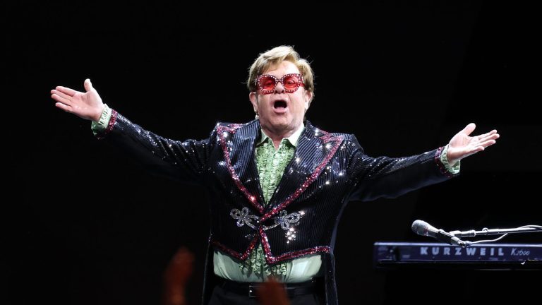 Elton John promises “a very special concert” at Glastonbury, where he bids farewell to the British public on Sunday