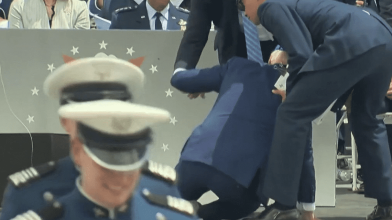 Joe Biden falls during a ceremony