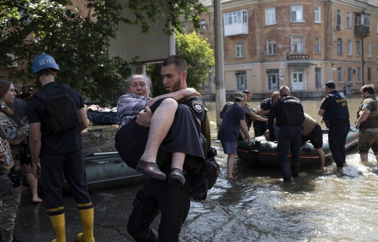 Kyiv and Moscow evacuate civilians from areas flooded by dam destruction