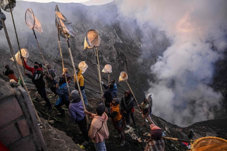 Sacrificial offerings thrown into the crater of a volcano