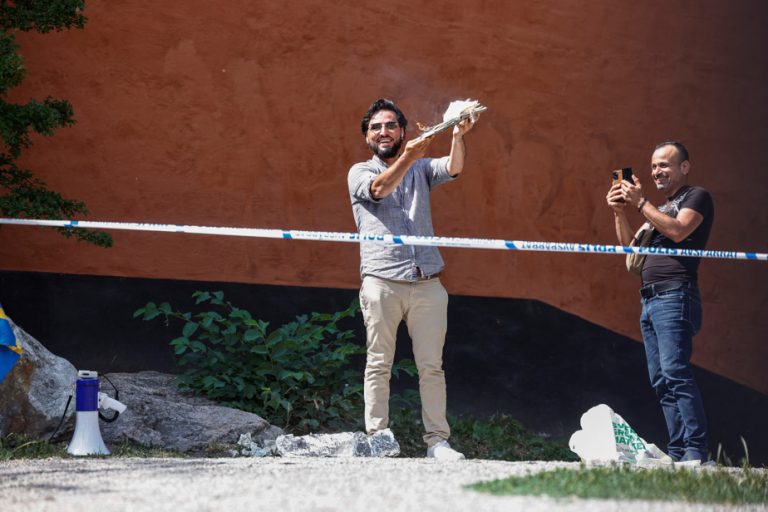 Sweden |  A man burns pages of the Koran in front of a mosque