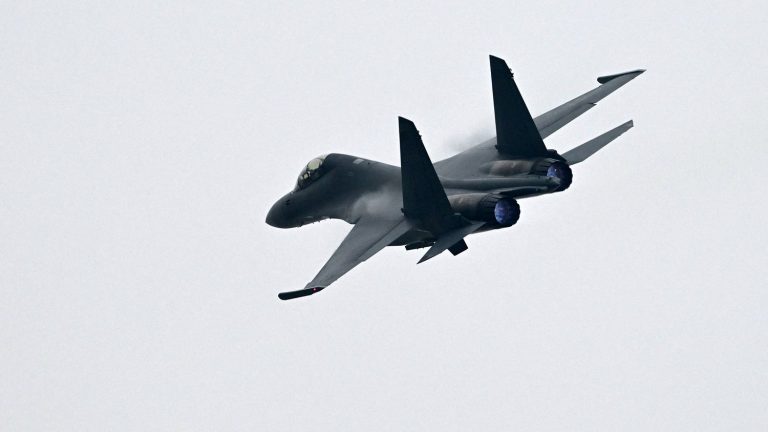 Taipei says eight Chinese military planes passed near its waters