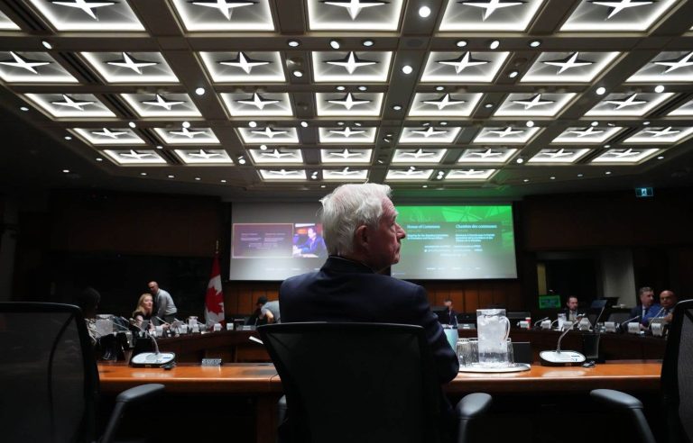 Under fire from opposition critics, David Johnston defends himself