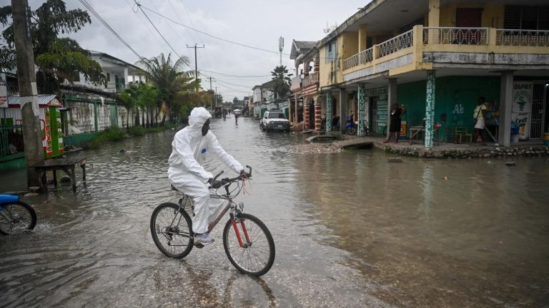 at least 42 dead and more than 13,000 displaced after floods