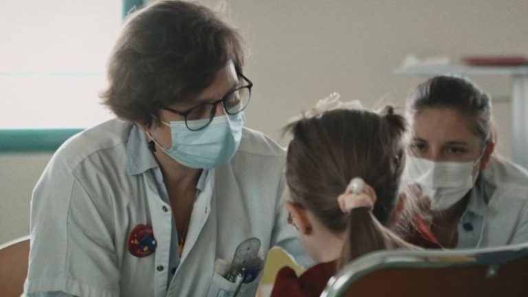 meet a surgeon who goes to the bedside of refugee children