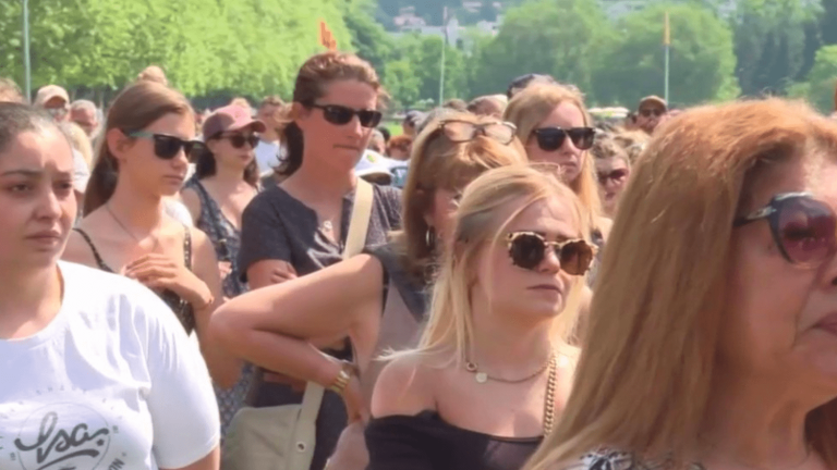 strong emotion during the citizen rally in tribute to the victims