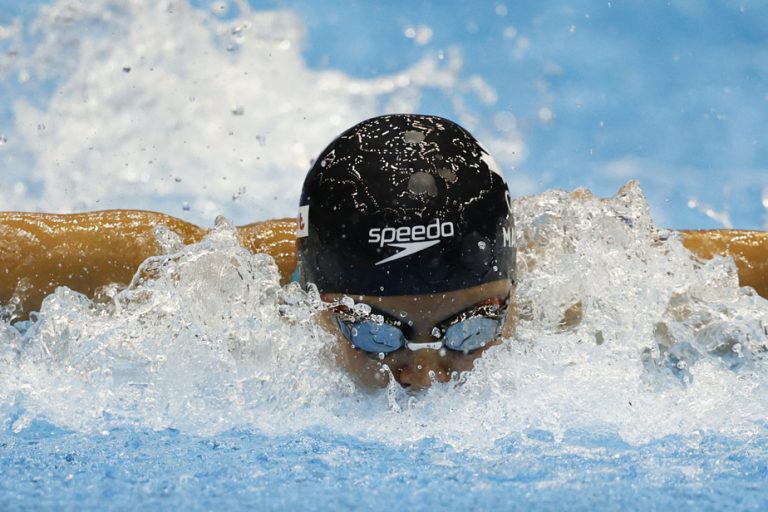 Aquatic Worlds |  Maggie MacNeil wins silver in the 100m butterfly