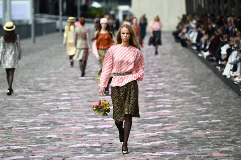 Chanel parades on the banks of the Seine