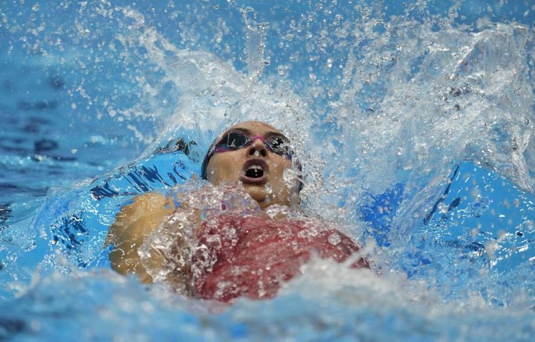 Kylie Masse finishes at the foot of the podium in the 100m backstroke at the World Aquatics