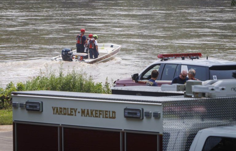 Two children swept away by flash flooding after heavy downpours in the United States