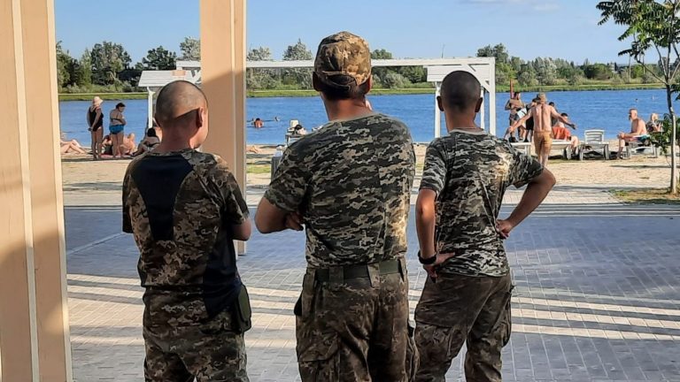 in Sloviansk, Ukrainian soldiers on a break for a few hours on the beach