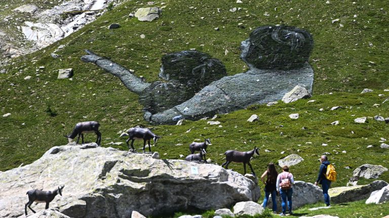 the artist Saype unveils a giant fresco at the foot of Mont-Blanc to celebrate the immensity and fragility of nature