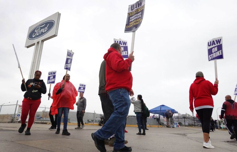 Biden and Trump make rival visits to auto strikers