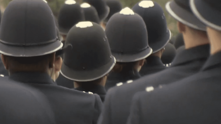 more than a thousand British police officers suspended