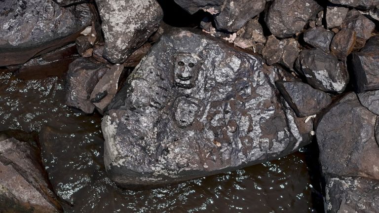 In the Amazon, drought reveals ancient carvings in rivers at exceptionally low levels