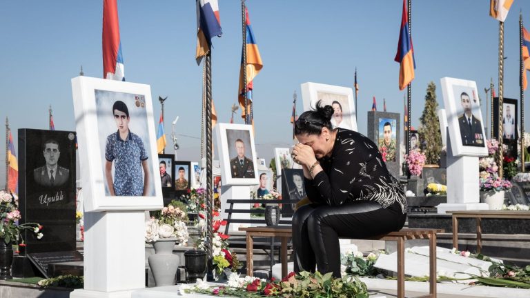 two weeks after the war in Nagorno-Karabakh, refugees continue to bury their dead