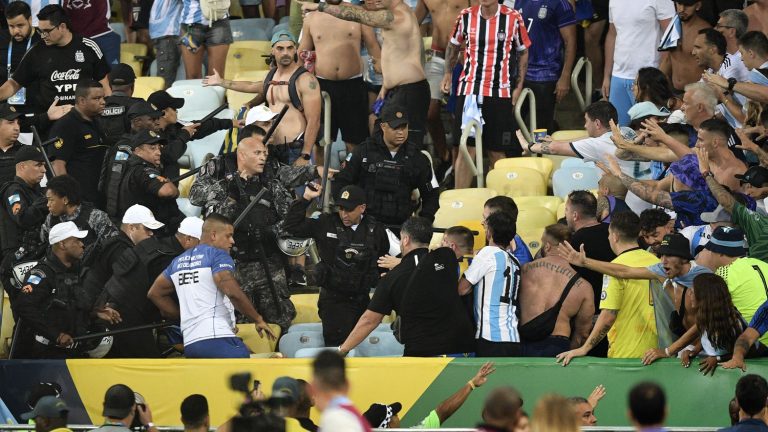 Clashes between fans delay kick-off of Brazil-Argentina match