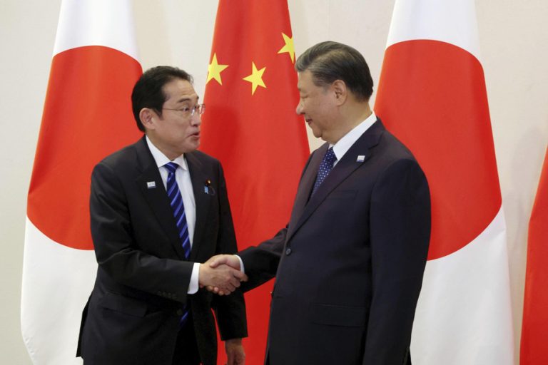 Japanese PM tells Xi concerned about Chinese military activities