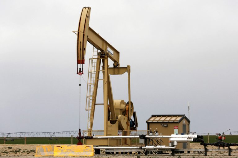 Oil up slightly after confirmation of production cuts