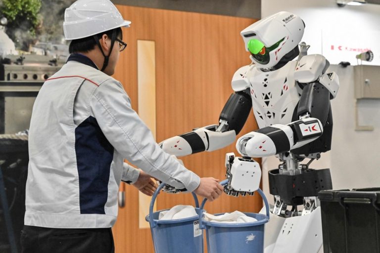 Robots and humanoids show off their prowess at an exhibition in Tokyo