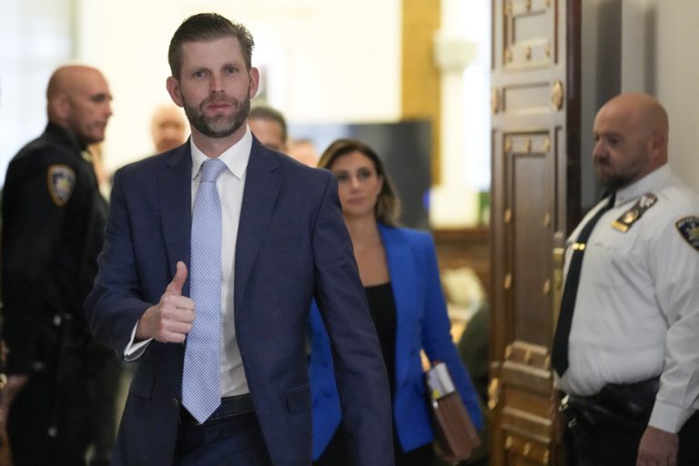 Under fire from questions, the Trump sons try to unite in court