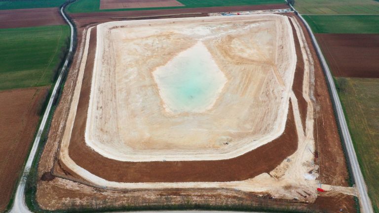 a drone monitors the construction sites of three water reservoirs