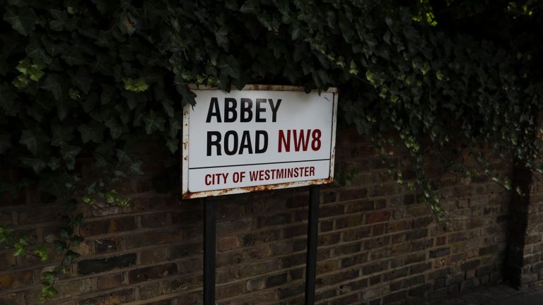 gathered in front of Abbey Road studios, Beatles fans praise the latest song “Now And Then”