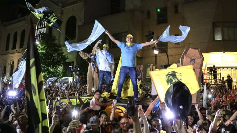 in the streets of Buenos Aires, the crowd welcomes the election of the new Argentine president Javier Milei