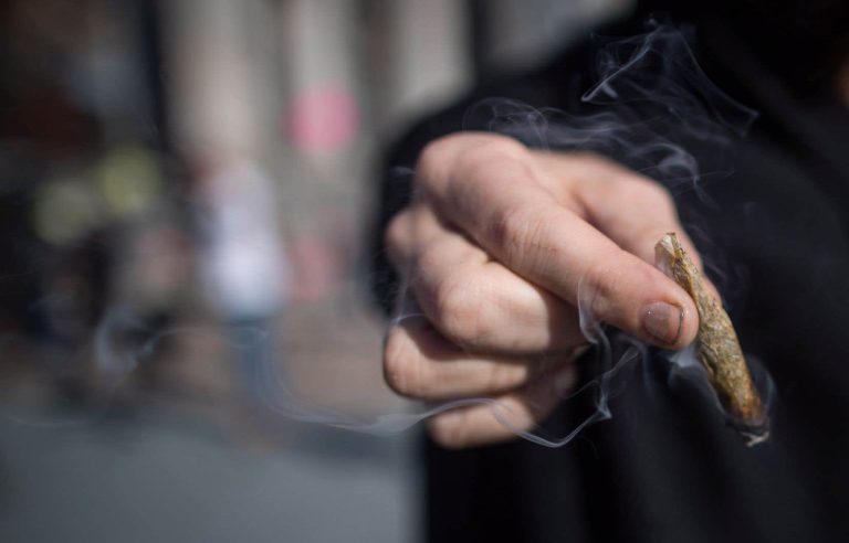 Man sentenced to pay more than $100,000 for smoking cannabis at home