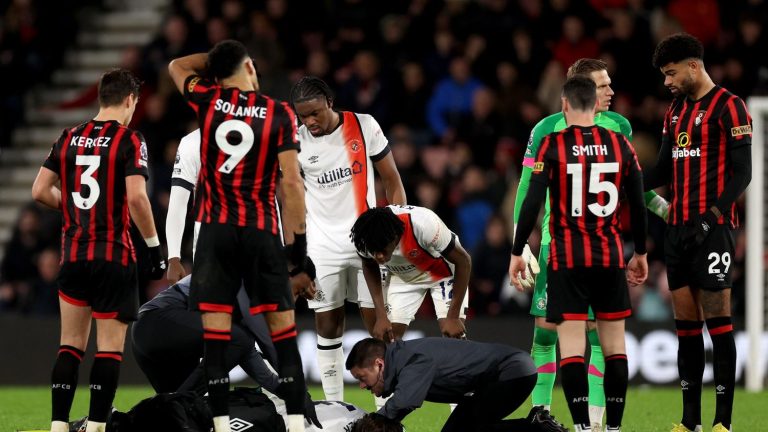 the match between Bournemouth and Luton stopped after a player becomes unwell