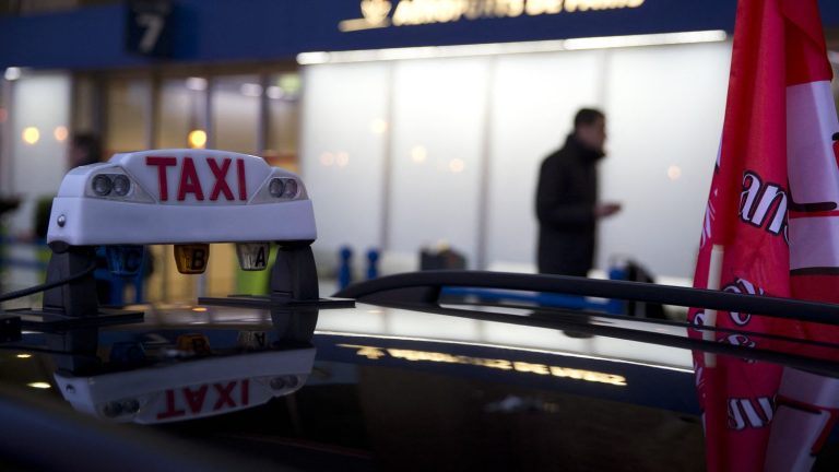 three men arrested on suspicion of spying on taxi police to better scam tourists