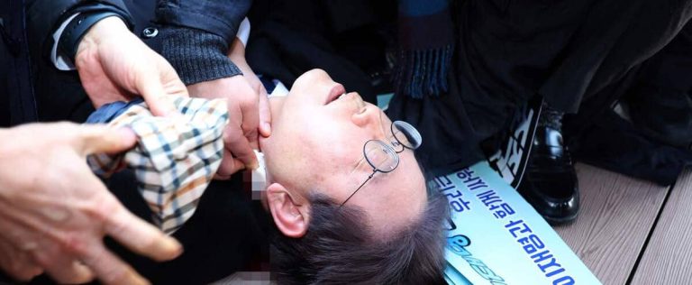 South Korean opposition leader stabbed in neck