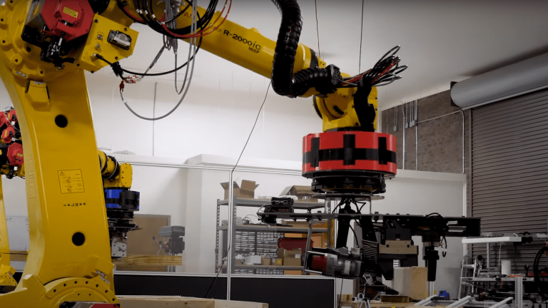 a start-up develops a robotic arm to speed up house construction