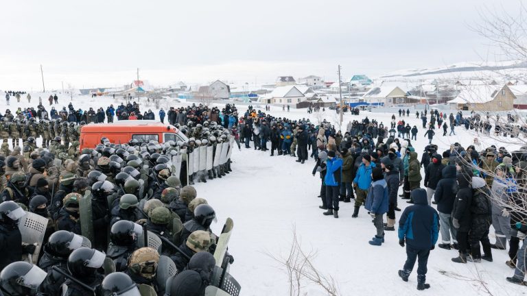 scuffles between demonstrators and police after the conviction of a local opponent