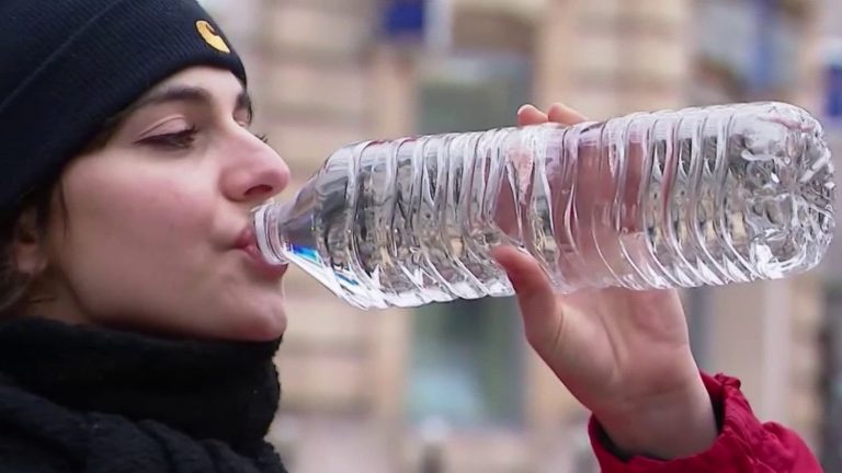 thousands of plastic particles in bottled water