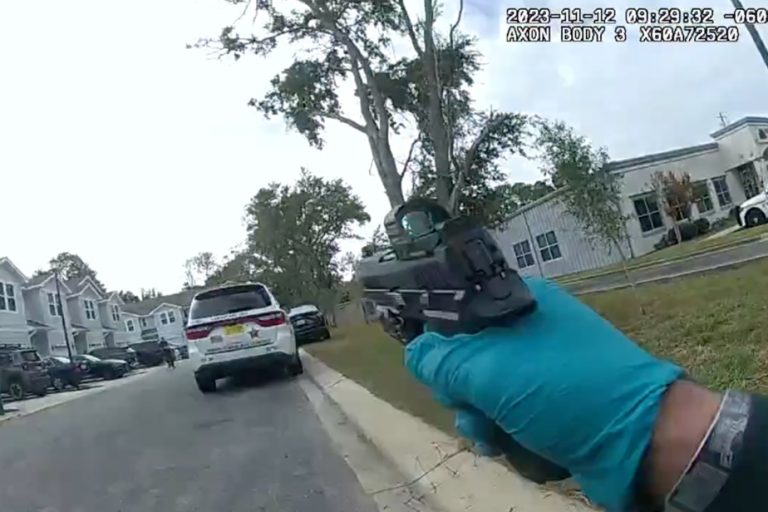 An acorn falls on his car, an American police officer empties his magazine