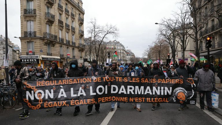 thousands of people demonstrate to demand the repeal of the immigration law