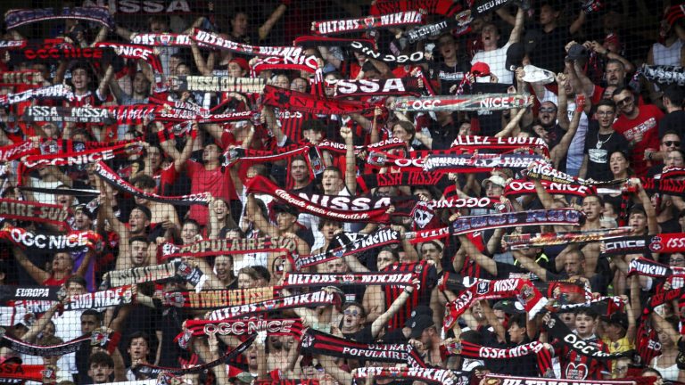 a bus of OGC Nice supporters targeted by a stone after the match against Olympique Lyonnais